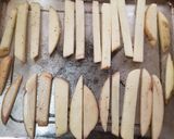 Foto del paso 3 de la receta: Papas a la francesa horneadas