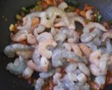 A picture of step 2 of Prawns in coconut curry.