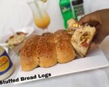 A picture of step 12 of Stuffed Bread Logs.