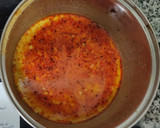 Foto del paso 4 de la receta: Salmón con leche, curry rojo y patatas bravas