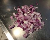 A picture of step 3 of Endive Salad with Cucumber and Red Onion in Chive Dressing.