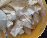 A picture of step 4 of Pina colada fruit salad.
