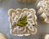 A picture of step 7 of Badam ne Chokhana lotna phiniya ladoo(Almond and rice flour whipped ladoo).