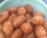 A picture of step 1 of Packed Potatoes with Coconut n Tamarind sauces#Theme Challenge.
