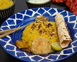 A picture of step 5 of Lemon Lal Msoor Dal Khichdi With Roasted Papad, Chokha, Dahi And Achar.