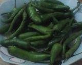 A picture of step 1 of Gajer Mouli or Hari Mirch ka Achar.