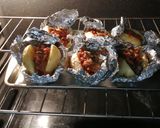 A picture of step 17 of Baked Potatoes Stuffed with Mushrooms, Chorizo, and Chipotle Cream.