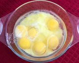 A picture of step 1 of Cheesy Egg Muffins.