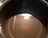 A picture of step 1 of Cardamom Milk Tea (Alaichii Wali dhood pati Chai).