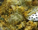 A picture of step 3 of Vatli Dal - Ground Lentil stir fry.