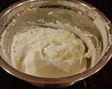 A picture of step 20 of White Layer Cake with a Raspberry Swirl Cheesecake center layer and a Raspberry Cream Frosting.