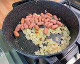A picture of step 6 of Mini Pork Sausages with Red Pesto, Garlic, Onion, and Oregano.