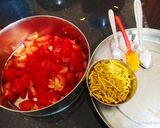 A picture of step 1 of Sev tamatar nu saag.