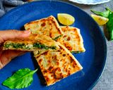 A picture of step 9 of Gozleme / Turkish stuffed flat bread.