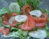 Foto del paso 8 de la receta: Alitas de pollo con papas, boniatos al horno y ensalada