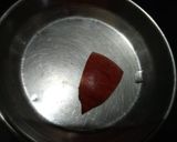 A picture of step 2 of Dents De vampire with glass of blood.