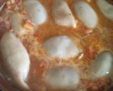 Foto del paso 4 de la receta: Calamares rellenos en salsa de camarones y aceitunas