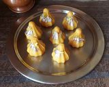 A picture of step 7 of Kesar-Pista Mawa Modak.
