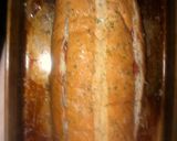 A picture of step 5 of Pizza baked stuffed French bread.