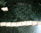 A picture of step 11 of Khaja sweet.
