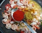A picture of step 2 of Prawns onion tomato masala.