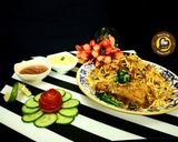 A picture of step 13 of Delhi's layered chicken Dum Biryani.