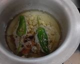 A picture of step 6 of Urad/maash ki khatti daal with bajrey ki roti.