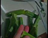 A picture of step 1 of Khatay Masalay ki bhindi.