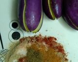 A picture of step 1 of Kashmiri Khatte Baigan with Khasta Puri.