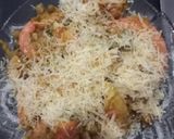 Foto del paso 3 de la receta: Arroz amarillo con langostinos y chipirones