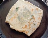 A picture of step 7 of Gozleme / Turkish stuffed flat bread.