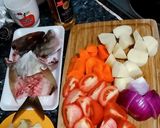 A picture of step 1 of 🍅 🥕 🥔 🐟 abc soup.