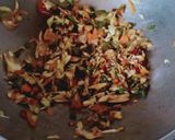 A picture of step 3 of Cheesy schezwan Maggi.