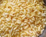 A picture of step 1 of Mudhi Muan Laddu /murmurs gur laddu /puffed rice laddu.