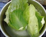 Foto langkah ke 1 dari resep Sayur kol goreng isi ayam daging.