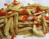 Foto del paso 9 de la receta Matambre tiernizado a la pizza con patatas, ajos y pimientos fritos