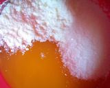 A picture of step 13 of Coconut puff puff and costard.