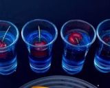 A picture of step 2 of Butterfly pea tea shots.