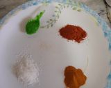 A picture of step 1 of Matar Masala.