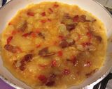 A picture of step 6 of Spanish Potato Omelette with Onion, Red Pepper, and Ham.