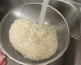 A picture of step 5 of Yellow Rice with Jalapeños and Tomatoes.