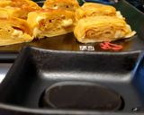 Une image de l'étape 15 de Tamagoyaki (omelette japonaise sucrée).