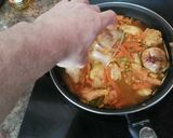 Foto del paso 6 de la receta Pollo al curry con leche de coco y cilantro