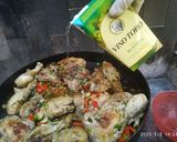 Foto del paso 4 de la receta: Pollo a la calabresa al disco con papas rústicas rabiosas
