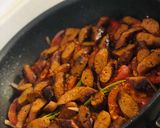 A picture of step 1 of Portuguese Egg with Masala Sausage@mubina_18.
