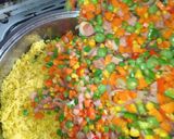 A picture of step 7 of Turmeric fried rice and fried chicken.
