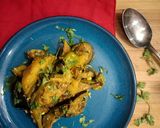A picture of step 9 of Aloo Baingan.