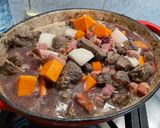 A picture of step 21 of Beef Bourguignon with Sweet Potato, Carrots, Turnips, and Mushrooms.
