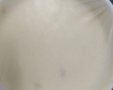 A picture of step 4 of Kesar pista ice cream cake.