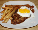 Foto del paso 7 de la receta: MILANESA A CABALLO CON RIENDAS. JON STYLE